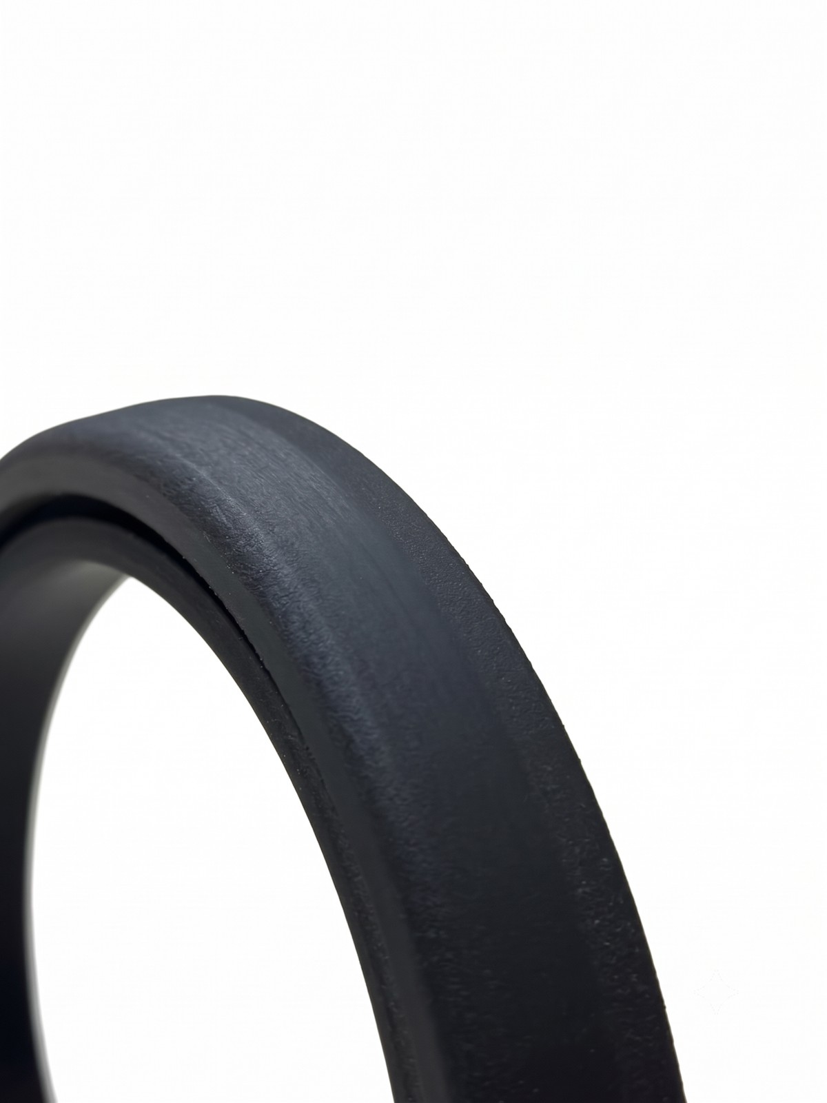 Close-up of machined creaser ring surface
